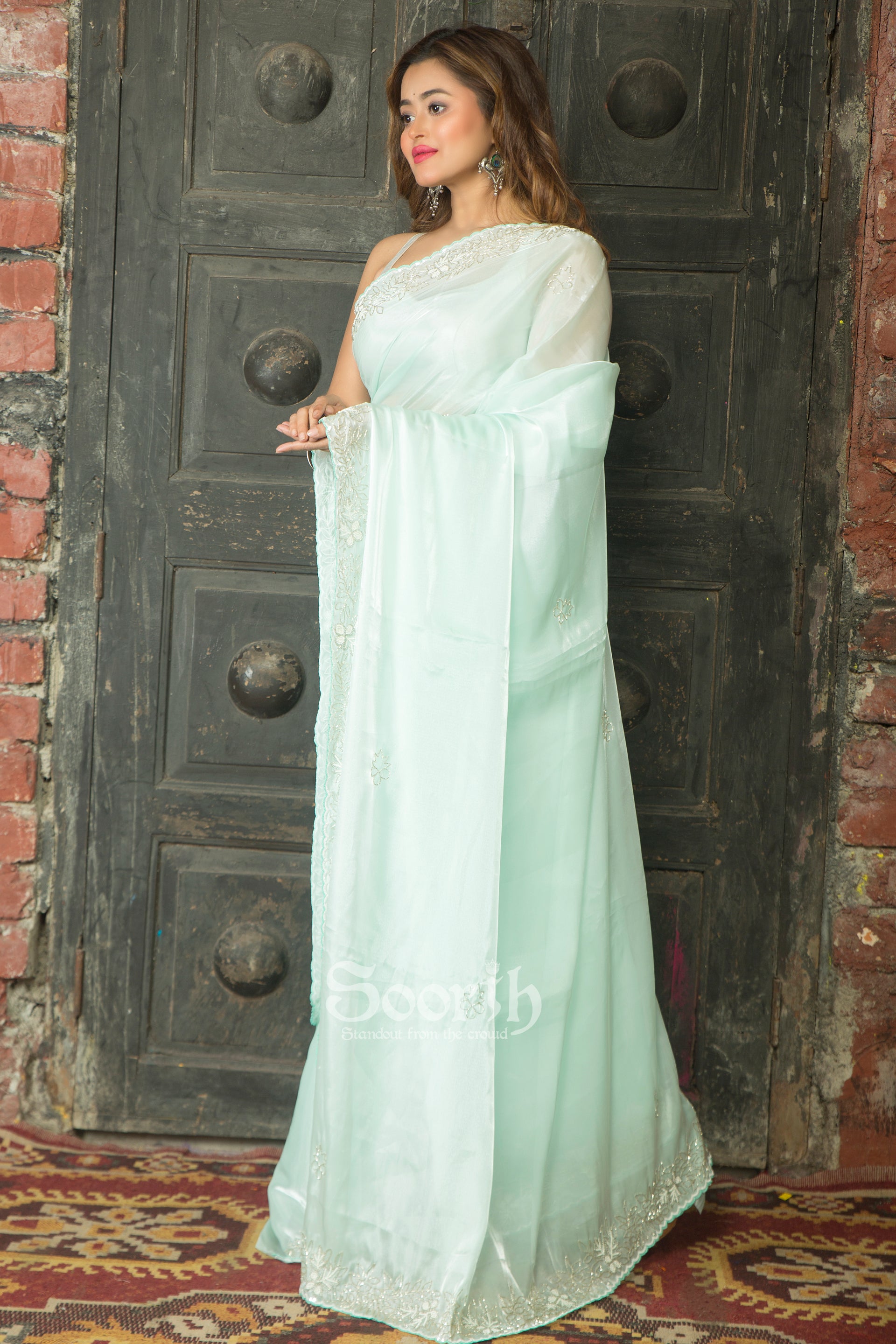 Lustrous Aqua Elegance Saree